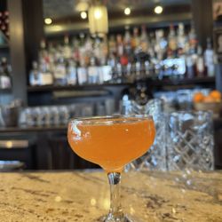 Northeast Social - Chefs Choice Cocktail- jalapeño and basil infused gin, aperol, cucumber oleo and lemon.