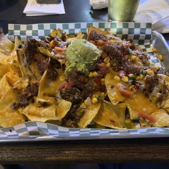 The Hawk's Nest - Sheet Tray Nachos - Sports Bars Near Me - Lincoln, Nebraska The Hawk's Nest - Sheet Tray Nachos - Sports Bars Near Me - Lincoln, Nebraska