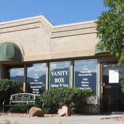 The Vanity Box Salon & Spa - Salon store front. West End Center - 755 Highway 105 - Suites O & P - Palmer Lake, CO. Notice the mountains in the windows....