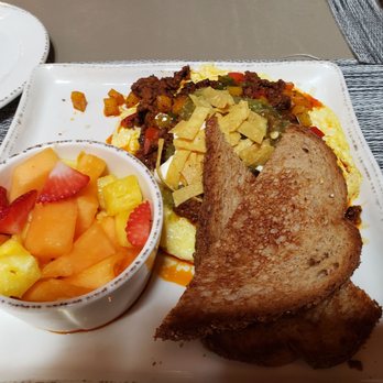 Mojave - The frittata... you can see the oil on the bottom of the fruit salad bowl... - Latin American Near Me - Sandy Springs, Georgia Mojave - The frittata... you can see the oil on the bottom of the fruit salad bowl... - Latin American Near Me - Sandy Springs, Georgia