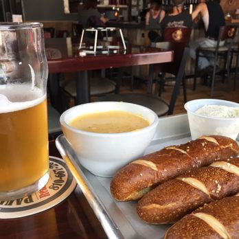 Tilted Axis Brewing Company - Pretzel with beer cheese and garlic creme cheese (some already eaten) - Breweries Near Me - Lapeer, Michigan