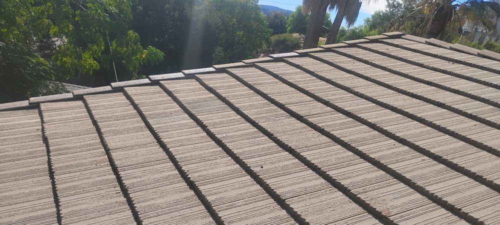 Slide of Spikes Roofing