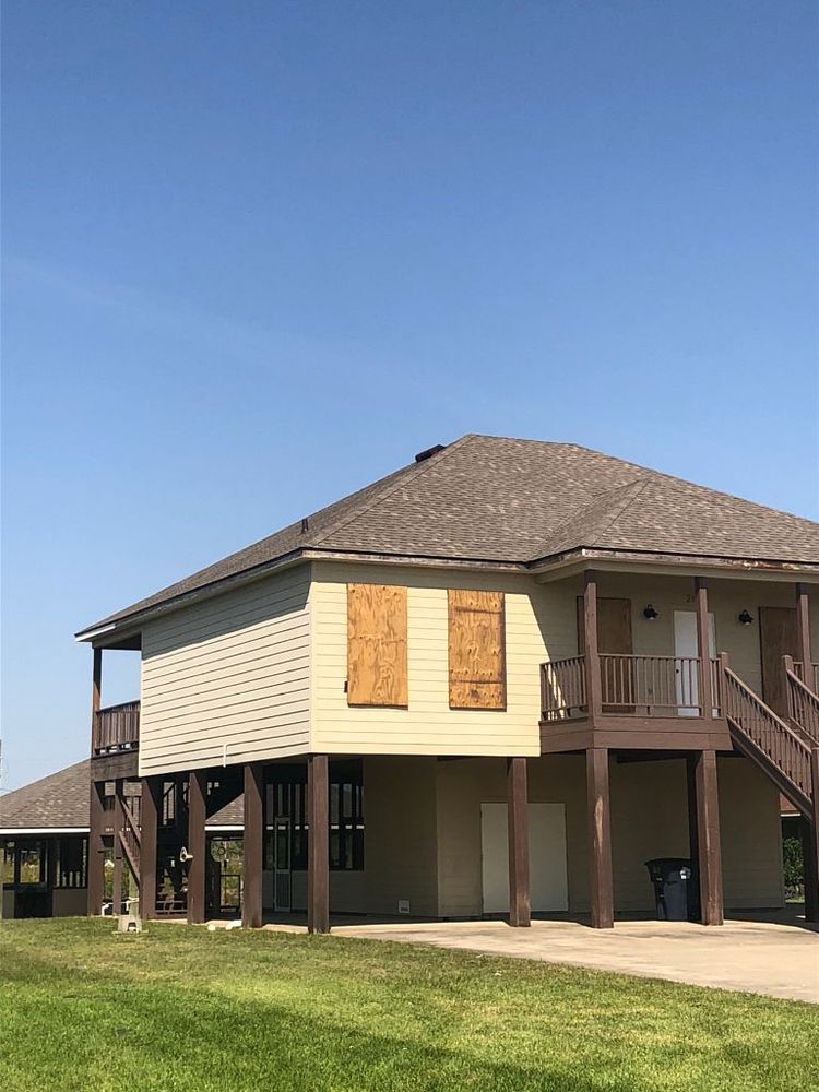 Slide of Pelican Roofing Company