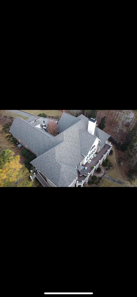 Slide of Capstone Roofing