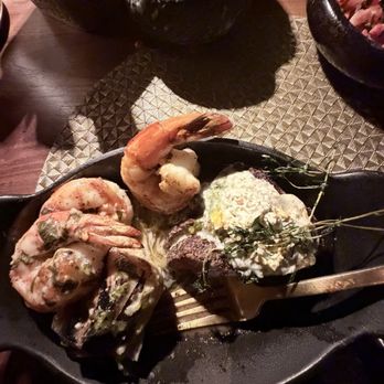 Toca Madera - Petite filet with shrimp & nonames drink - Steakhouses Near Me - Houston, Texas