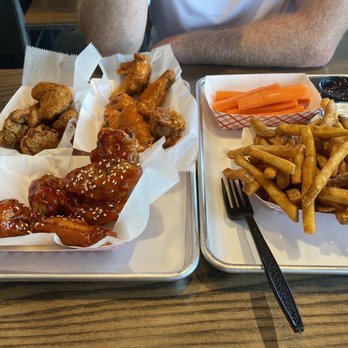 Fire Wings - Bone in Buffalo, bone in fusion (I forget which one we got), and boneless cali rub. Fries and carrots with ranch and bbq sauce - Chicken Wings Near Me - Long Beach, California Fire Wings - Bone in Buffalo, bone in fusion (I forget which one we got), and boneless cali rub. Fries and carrots with ranch and bbq sauce - Chicken Wings Near Me - Long Beach, California