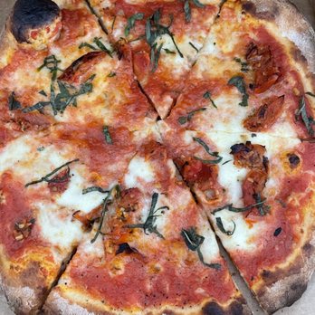 Prager Brothers Pizza - MARGHERITA (roasted tomatoes, fresh mozzarella, and basil) - Pizza Near Me - Carlsbad, California Prager Brothers Pizza - MARGHERITA (roasted tomatoes, fresh mozzarella, and basil) - Pizza Near Me - Carlsbad, California