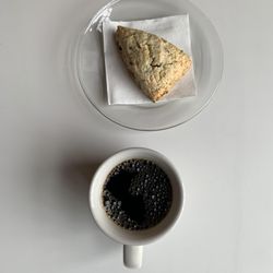 The Livingstone - Drip coffee and a cocoa-nut scone.