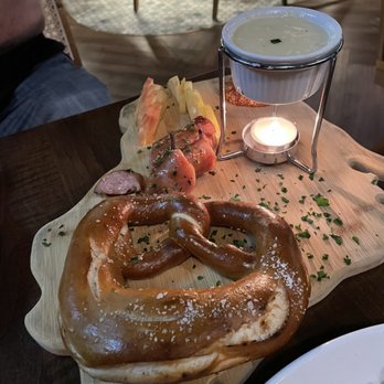 Fireside Burien - Pretzel with sausage, apple, mustard, and  beer cheese - Cocktail Bars Near Me - Burien, Washington