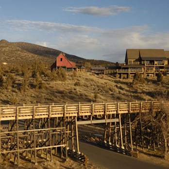 Brasada Ranch - Ranch House building that houses Ranch House restaurant is on right in this photo of Brasada Ranch entry - New American Near Me - Powell Butte, Oregon