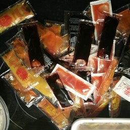 Way, way too many condiment packets for one spring roll and 3 small dishes for 2. Way, way too many condiment packets for one spring roll and 3 small dishes for 2.