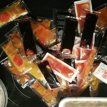 The Paper Crane - Way, way too many condiment packets for one spring roll and 3 small dishes for 2. - Asian Fusion Near Me - Wilmington, North Carolina The Paper Crane - Way, way too many condiment packets for one spring roll and 3 small dishes for 2. - Asian Fusion Near Me - Wilmington, North Carolina