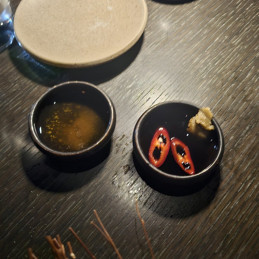 Musaek - Sauces with Fluke Hwe. Perilla with yuzu kosho and soy sauce with peppers. I liked the perilla - Korean Near Me - New York, New York Musaek - Sauces with Fluke Hwe. Perilla with yuzu kosho and soy sauce with peppers. I liked the perilla - Korean Near Me - New York, New York