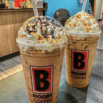 Biggby Coffee - Iced German Chocolate with an extra shot and whip along side an iced caramel latte. - Coffee & Tea Near Me - Roswell, Georgia