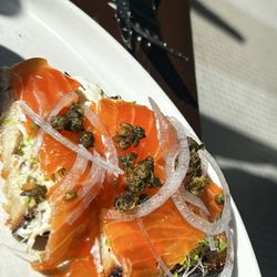 Marsh House - Gravlax Tartine. - SOOOO GOOD! House-cured salmon, dill caper cream cheese, alfalfa sprouts, shallots, fried capers, and Dozen sourdough.