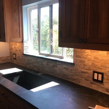 Rafael Tile Works - a kitchen counter with a window - Tiling Near Me Rafael Tile Works - a kitchen counter with a window - Tiling Near Me