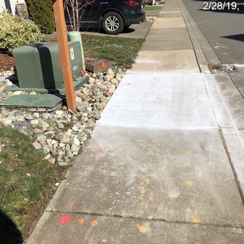 Full Bore - Concrete mix staining the existing sidewalk and some left in the lawn. - Well Drilling Near Me - Seattle, Washington Full Bore - Concrete mix staining the existing sidewalk and some left in the lawn. - Well Drilling Near Me - Seattle, Washington