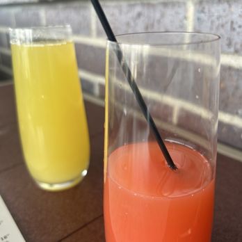 30hop - Cran-orange mimosa (front) Pineapple mimosa (behind) - Beer Bar Near Me - Lee's Summit, Missouri