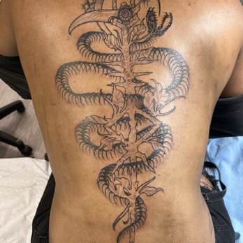 Eclipse Ink Tattoo Studio - Loki inspired tattoo by Cjay - Tattoo Near Me - New York, New York
