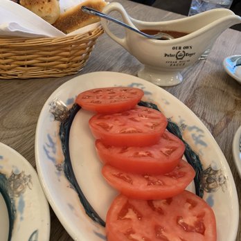 Peter Luger - Not worth $17. Tomatoes and their special sauce which tasted like cocktail Sauce. Sliced Tomato with Luger's Own sauce (for 2) - Steakhouses Near Me - Brooklyn, New York Peter Luger - Not worth $17. Tomatoes and their special sauce which tasted like cocktail Sauce. Sliced Tomato with Luger's Own sauce (for 2) - Steakhouses Near Me - Brooklyn, New York
