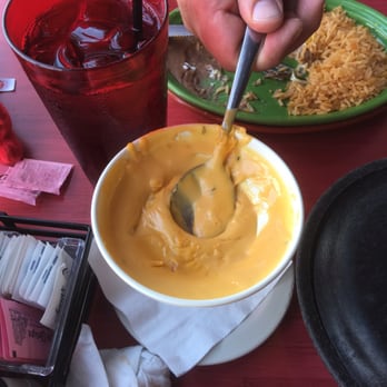 Fajita Jacks - This cheese lasted a grand total of 5-7 mins before it set like concrete. That's a small cup being held up by the spoon... O.o - Tex-Mex Near Me - Conroe, Texas Fajita Jacks - This cheese lasted a grand total of 5-7 mins before it set like concrete. That's a small cup being held up by the spoon... O.o - Tex-Mex Near Me - Conroe, Texas