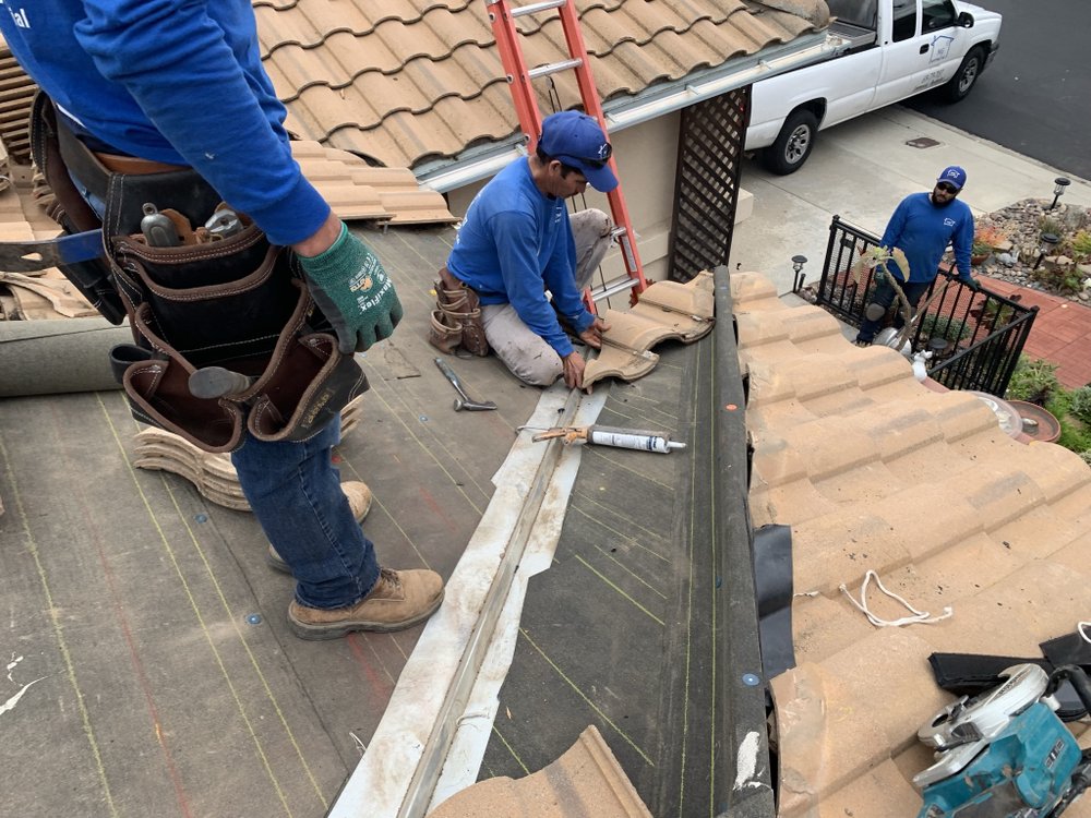 Slide of M G Roofing