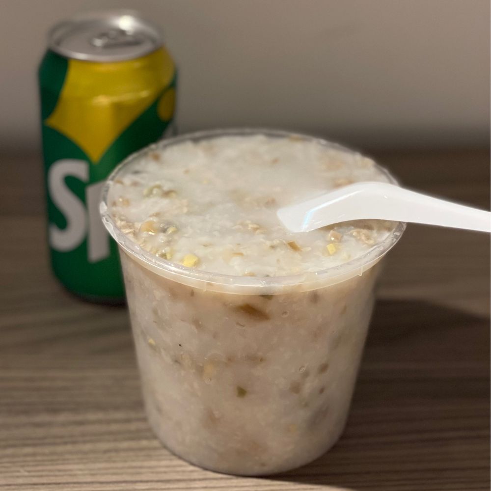皮蛋瘦肉粥. Congee. What more would you want? Ok, maybe some 7-Up. 皮蛋瘦肉粥. Congee. What more would you want? Ok, maybe some 7-Up.