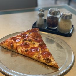 Slice of pepperoni and sausage always feeds the soul. $4 slice is a damn deal Slice of pepperoni and sausage always feeds the soul. $4 slice is a damn deal