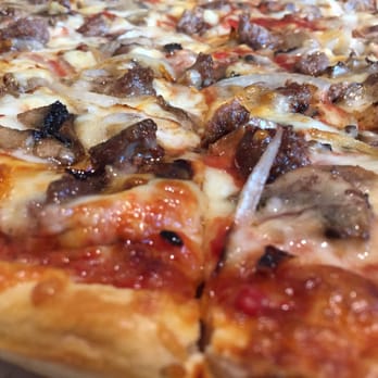 Papa George Pizza - a close up of a pizza - Pizza Near Me - Easthampton, Massachusetts