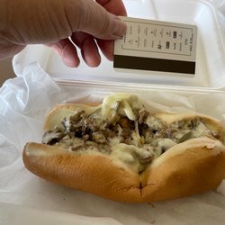 J Buffalo Wings - The $10 "Cheesesteak" with a room key for scale.
