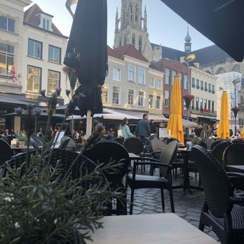 Con Fuego - View of the market and church - Diners Near Me - Breda, New Brunswick