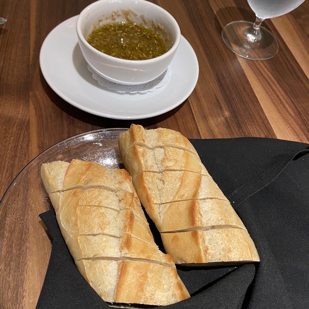 French Hen - French baguettes and a dipping sauce the waiter made for us. - French Near Me - Tulsa, Oklahoma