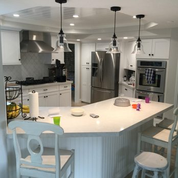 Jian's Kitchen & Plus - a kitchen with a large island - Flooring Near Me - Artesia, California