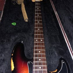 440 Instruments - Restrung and oiled the fretboard.