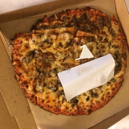 Pizza slid over to one side of the box with a receipt laying directly on the cheese. Seriously?!? Not how delivery is supposed to go. Pizza slid over to one side of the box with a receipt laying directly on the cheese. Seriously?!? Not how delivery is supposed to go.