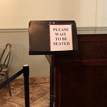Amina Thai - a sign that reads please wait to be seated - Thai Near Me - Silver Spring, Maryland Amina Thai - a sign that reads please wait to be seated - Thai Near Me - Silver Spring, Maryland