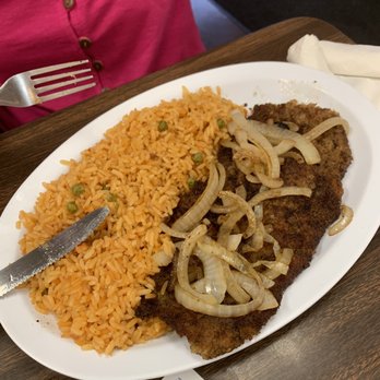Cafe Caribe - Breaded steak, grilled onions, rice - Cuban Near Me - Tampa, Florida Cafe Caribe - Breaded steak, grilled onions, rice - Cuban Near Me - Tampa, Florida
