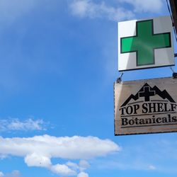 Top Shelf Botanicals Dispensary Ennis MT - Top Shelf Botanicals Sign