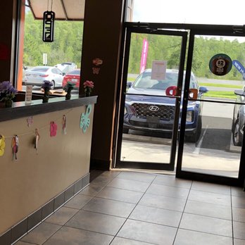 Dunkin' -  the entrance to a restaurant - Coffee & Tea Near Me - Kissimmee, Florida