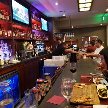 The Wine and Spirits Kitchen - Alex working the bar. - New American Near Me - Delray Beach, Florida The Wine and Spirits Kitchen - Alex working the bar. - New American Near Me - Delray Beach, Florida