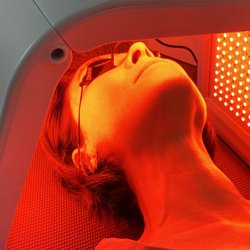 Kaila Hou Wellness & Anti-Aging Center - Facial light therapy - the red light aids in skin regeneration, promotes collagen proliferation, and improves wrinkles
