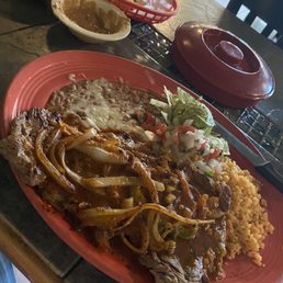 Steak ranchero, rice and beans