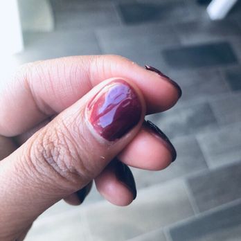 Aqua Nails Spa - Gel mani after 1 week. Top coat wasn't even or covering whole finger bed. You can see the bumps on my thumb from missed gel. - Nail Salons Near Me - Clovis, California