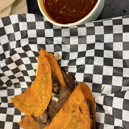 Birria tacos with consume