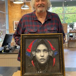 Beard's Framing - Our long-time customer with an art piece from Italy. A House of Mercier frame makes the eyes come to life.