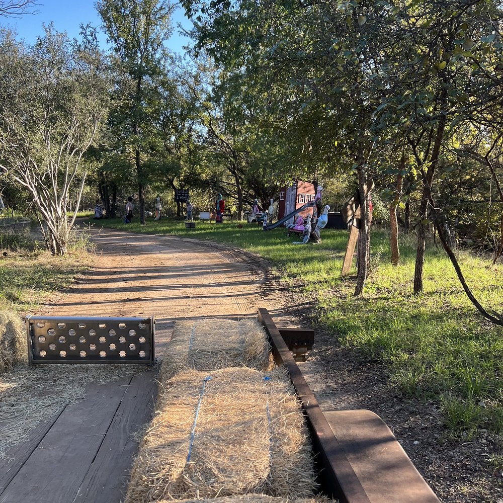 Sweet Berry Farm - the hayride goes for a go time Nd there are things to see all around. - Attraction Farms Near Me - Marble Falls, Texas