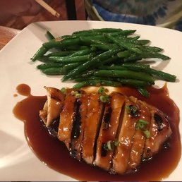 The chicken teriyaki with chives and green beans. The chicken teriyaki with chives and green beans.