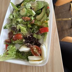 Cactus Club Cafe - Wtf !You go in and eat and this salad is a full meal! You order to go and it barely fills up the container halfway! Last time !