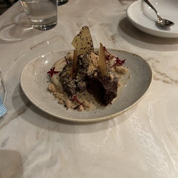 Ka'ana Kitchen - This was a chocolate cake with banana forsters Paris on the side very nice - Asian Fusion Near Me - Wailea, Hawaii Ka'ana Kitchen - This was a chocolate cake with banana forsters Paris on the side very nice - Asian Fusion Near Me - Wailea, Hawaii