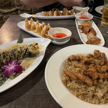 MoMo Sushi & Grill - Pictured is the Fire Cracker roll, chicken and fried rice, egg rolls, and the Crab Rangoons. - Sushi Bars Near Me - Branson, Missouri MoMo Sushi & Grill - Pictured is the Fire Cracker roll, chicken and fried rice, egg rolls, and the Crab Rangoons. - Sushi Bars Near Me - Branson, Missouri